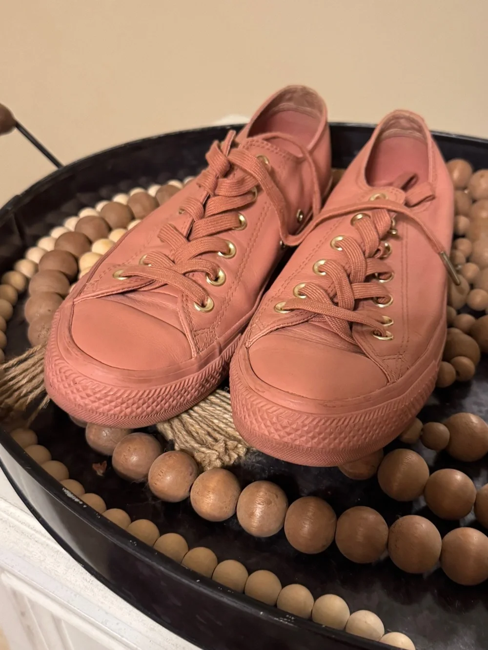 Converse gold toned